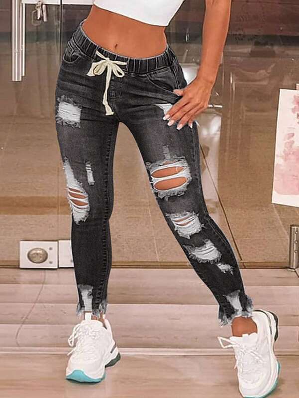 Jeans de Alta Elasticidad para Mujer - en negro con cordón en la cintura y rasgados